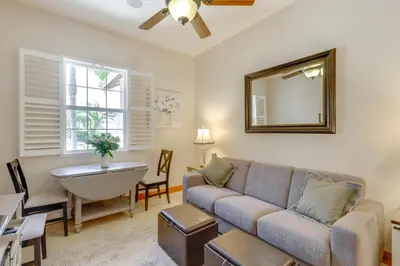a living room with a couch and a mirror at Private and Spacious Deluxe Rolling Hills Ranch Gem in Chula Vista