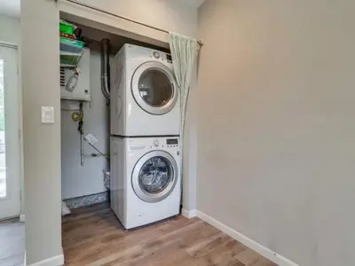 a washer and dryer in a laundry room at Bay Park Gem - Fully Loaded in San Diego
