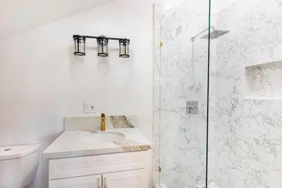 a bathroom with a sink and a shower at San Diego Getaway, Views Pool Hot Tub & Game Room in Valley Center