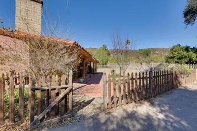 a wooden fence in front of a house at 4 Mi to Lake Wohlford Cabin in Escondido in Valley Center