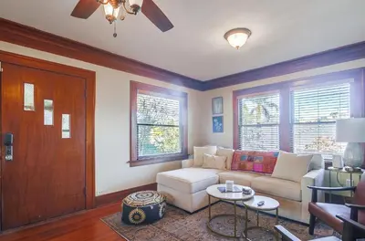 a living room with a couch and a table at Sunny San Diego Golden Hill Home! Pet Friendly, near DT, Fully Stocked! in San Diego