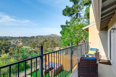 a balcony with a view of the mountains at Balconies and Views Modern Abode in Poway! in Poway