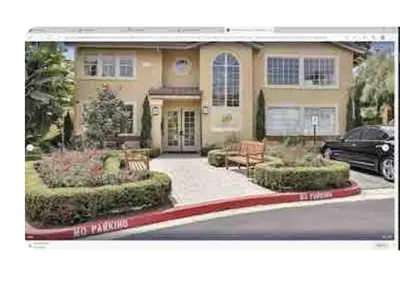 a house with a car parked in front of it at Ritz Pointe dr in Dana Point