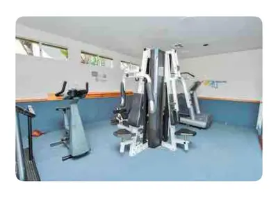 a room with a gym with several exercise equipment at Ritz Pointe dr in Dana Point