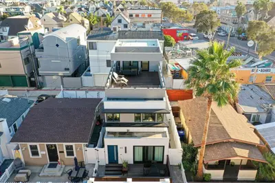 an aerial view of a house in a city at Ocean View Luxury Beach Homes With AC and Parking in San Diego