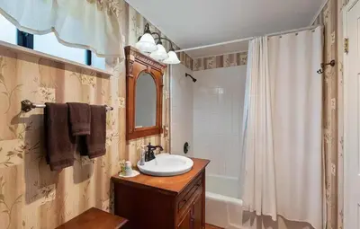 a bathroom with a sink and a shower and a tub at Eaglenest Inn with Pool & Seasonal SPA in Julian