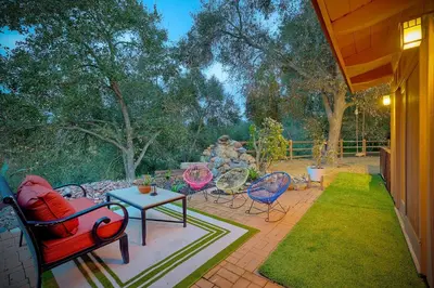 a patio with a group of chairs and a table at 3046 Skycrest Drive in Fallbrook
