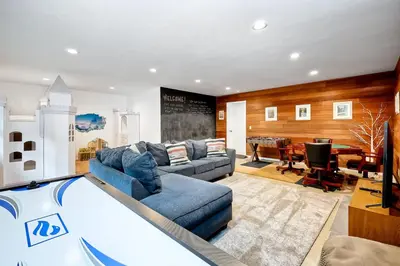 a living room with a couch and a dining room at 3046 Skycrest Drive in Fallbrook
