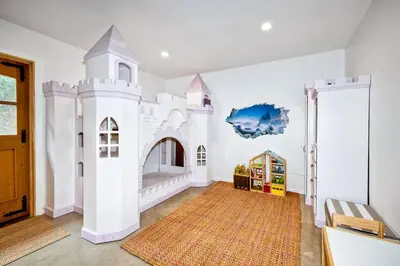 a childs room with a castle mural on the wall at 3046 Skycrest Drive in Fallbrook