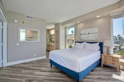 a bedroom with a bed and a window at 901 S Pacific in Oceanside