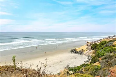 a view of a beach with a train on it at Dolphin's Drift - DMST50 in Solana Beach