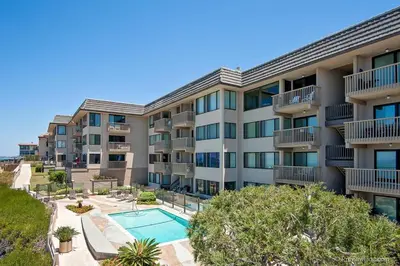 an image of an apartment building with a swimming pool at Ocean Infinity - DMBC727B in Solana Beach
