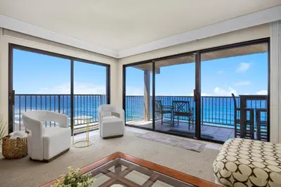 a living room with a view of the ocean at Sunglow Horizon - DMBC873B in Solana Beach