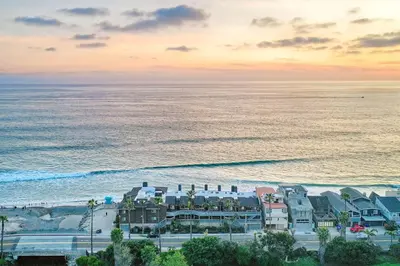 an aerial view of the beach and the ocean at 1445 S Pacific Street Unit E in Oceanside