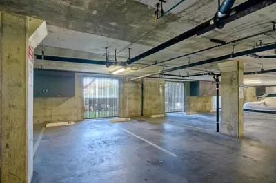 an empty parking lot in an old building at 441 S Sierra - Unit 301 in Solana Beach