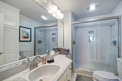 a bathroom with a sink and a shower and a toilet at 441 S Sierra - Unit 301 in Solana Beach