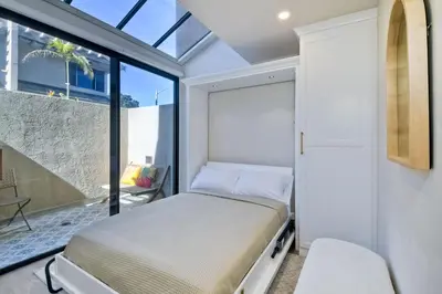 a bedroom with a bed and a window at 916 Sea Lane in Encinitas