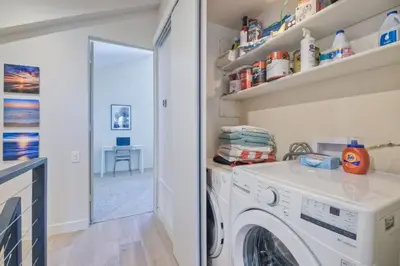 a laundry room with a washer and dryer at 916 Sea Lane in Encinitas