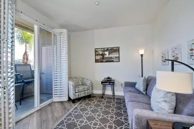 a living room with a couch and a table at 4025 Canario Street in Carlsbad