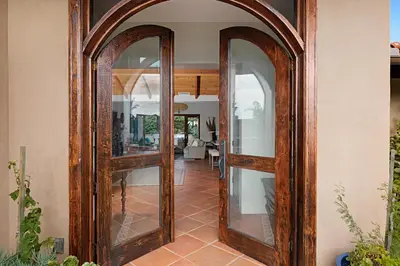 a hallway with two mirrors on a wall at 5194 Carlsbad - Entire Home in Carlsbad