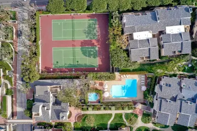 an overhead view of a house with a tennis court at 597 S Sierra Avenue - Unit 69 in Solana Beach