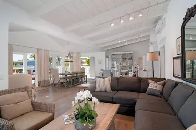 a living room with a couch and a table at 190 Walnut in Carlsbad