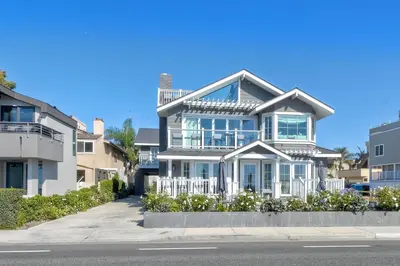 a large house on the side of a street at 3636 Carlsbad Blvd - Lower in Carlsbad