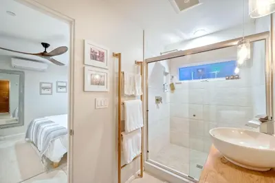 a bathroom with a sink and a shower at 253 E Jason Street in Encinitas