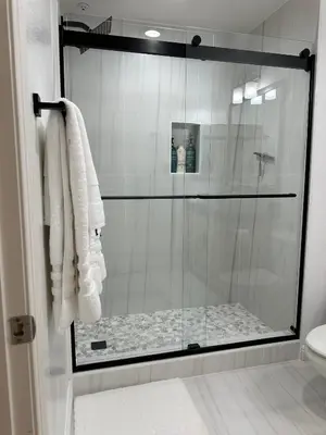 a shower with a glass door in a bathroom at Irvine Gem Luxury condo 31 days min near Irvine Business & UCI Hospital in Irvine