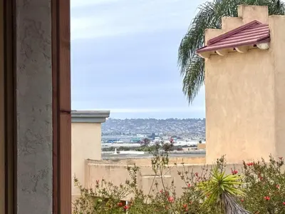 a view of the city from the balcony of a house at Titus Retreat in San Diego