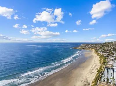 an aerial view of the beach and ocean at Newly Renovated Pacific Beach Home with Private Yard and AC in San Diego