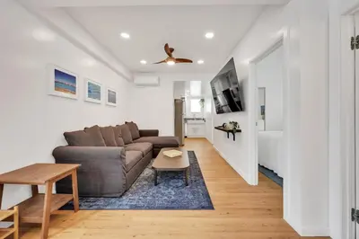 a living room with a couch and a table at Harborside Suite 06 with Hot Tub and King Beds in San Diego