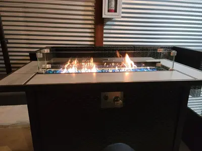 a grill with a bunch of fire in it at Harborside Suite 04 with Hot Tub and King Bed in San Diego