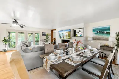 a living room with a table and a couch at Entire Private Home with 4 Bedrooms 2 Bathrooms, Spacious, Lux King Bed, Ranch Style, Prime Area, Available Now in La Mesa
