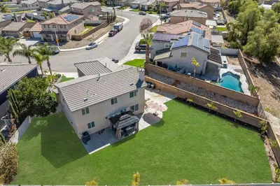 an aerial view of a house with a yard at Carroll Family Retreat in San Jacinto