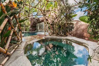 a swimming pool with an elephant in the background at Paradise Lagoon Resort Style Pool Getaway in La Mesa