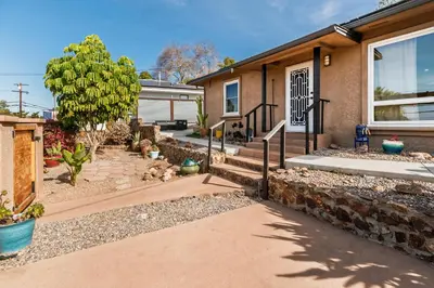 a home with a staircase leading to the front door at Downtown La Mesa gem in La Mesa