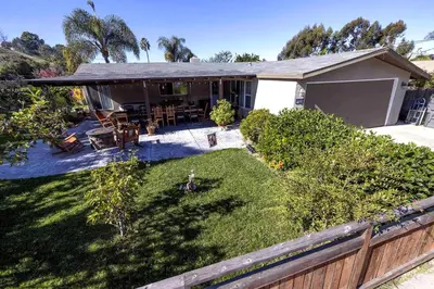 an aerial view of a house with a yard at Near SoCal sports complex, Frontwave Arena-Sold in Oceanside
