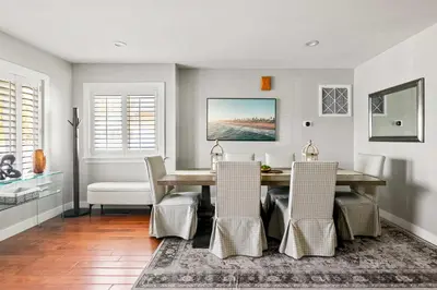 a dining room with a table and chairs at Cozy 3BR Steps to Dining & Attractions in San Diego