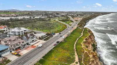 an aerial view of a road next to the ocean at Ocean View Luxury Living in Carlsbad
