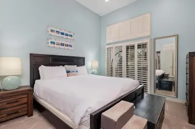 a bedroom with a large bed and a window at Breeze & Bridle - TC530J in Solana Beach