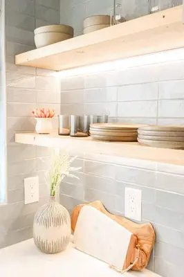 a kitchen with wooden shelves and a vase on a counter at Chic Surf Lodge with Hot Tub & Ocean Views in Oceanside
