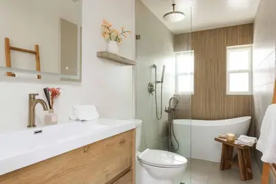 a bathroom with a sink and a toilet and a shower at Chic Surf Lodge with Hot Tub & Ocean Views in Oceanside