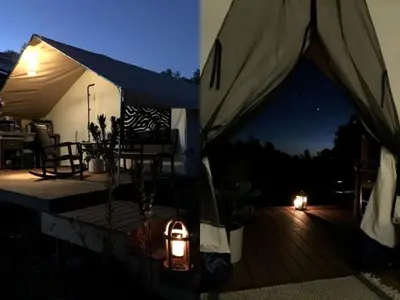 a tent on top of a deck at night at African-Inspired Safari Tent near San Diego for a Glamping Weekend in Vista, California in Vista