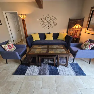 a living room with a couch and a coffee table at Wise in San Diego