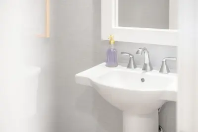a white bathroom with a sink and a mirror at Grand Luxury 4BD Estate in Irvine in Irvine
