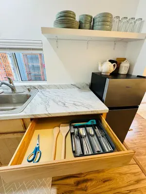 a kitchen with a drawer with scissors and knives at Cozy Guesthouse - 15 Min to Downtown SD in Chula Vista