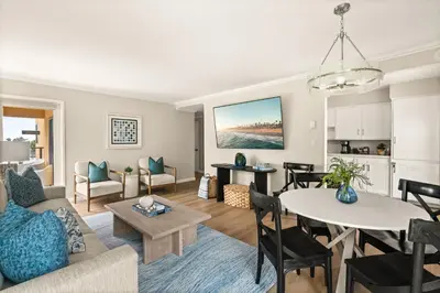 a living room with a couch and a table at Seize the Day in San Diego
