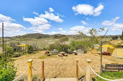 a yard with a rope fence and a tent at Near Ramona Wineries Mtn-View Haven with Large Yard in Ramona