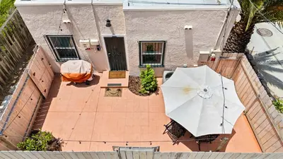 an overhead view of a patio with a white umbrella at Cozy Ocean Beach Bungalow in San Diego